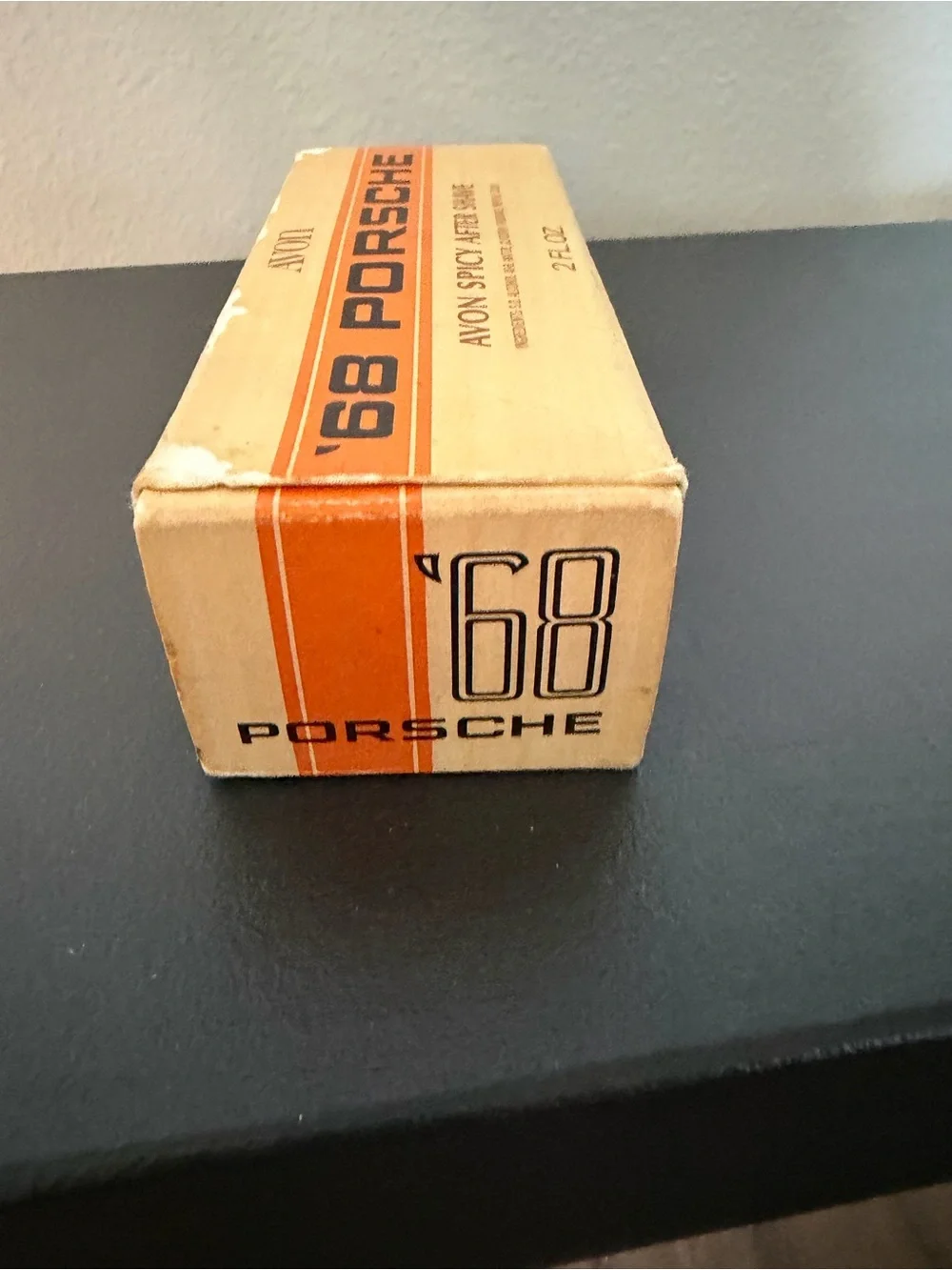 Vintage collectible Avon '68 Porsche Spicy After Shave - Orange and Cream Box